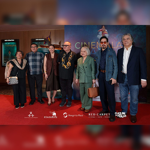 Festival organizers, executives, and filmmakers walk the red carpet at the opening of the 21st Cinemalaya Philippine Independent Film Festival